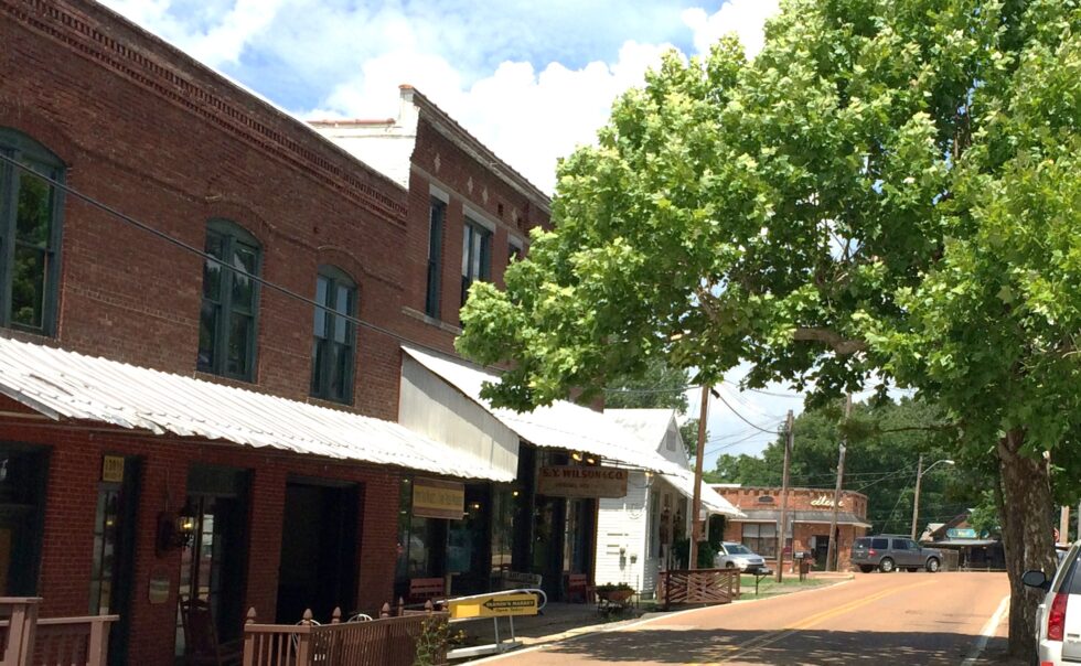 Historic brick storefronts along Walker Street in downtown Arlington, Tennessee