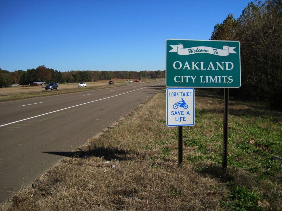 Oakland city limits sign along Highway 64 in Fayette County, Tennessee